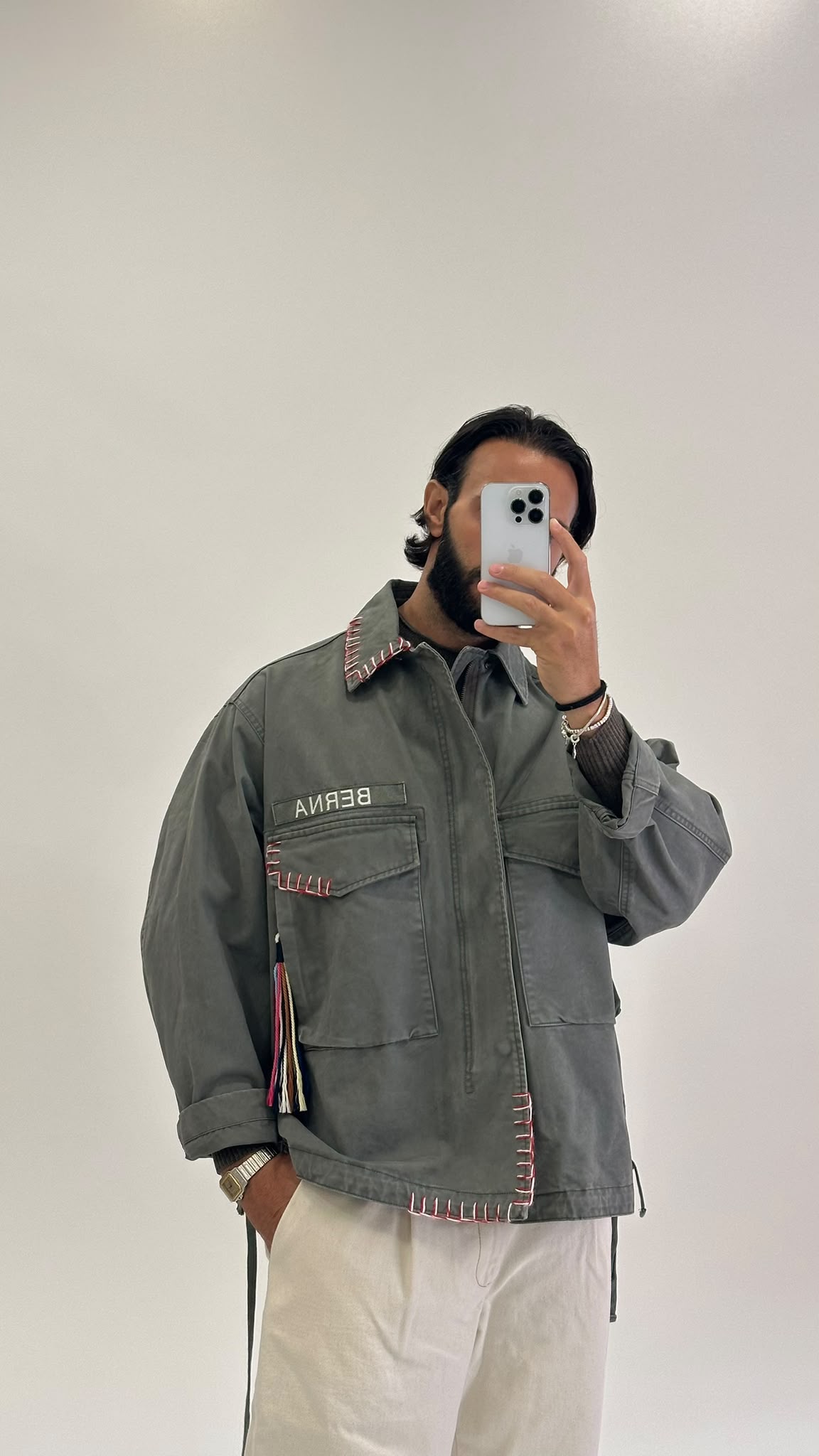 Field jacket verde militare con cuciture a contrasto