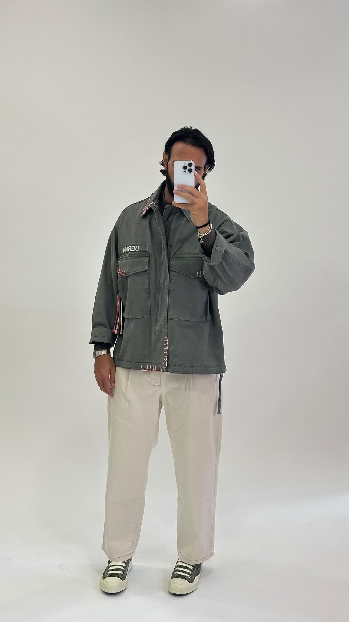 Field jacket verde militare con cuciture a contrasto