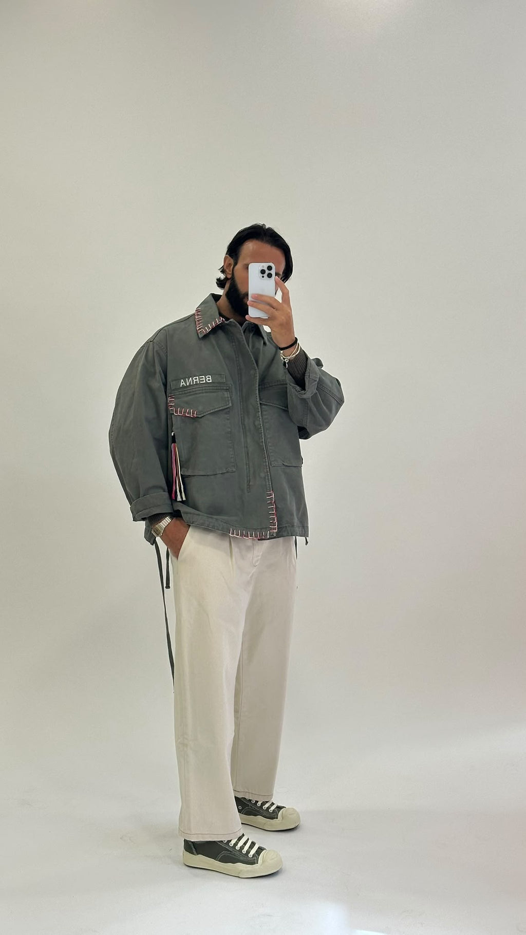 Field jacket verde militare con cuciture a contrasto