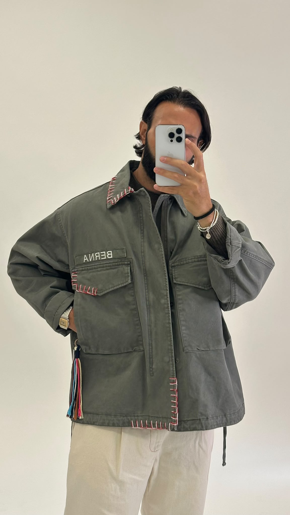 Field jacket verde militare con cuciture a contrasto