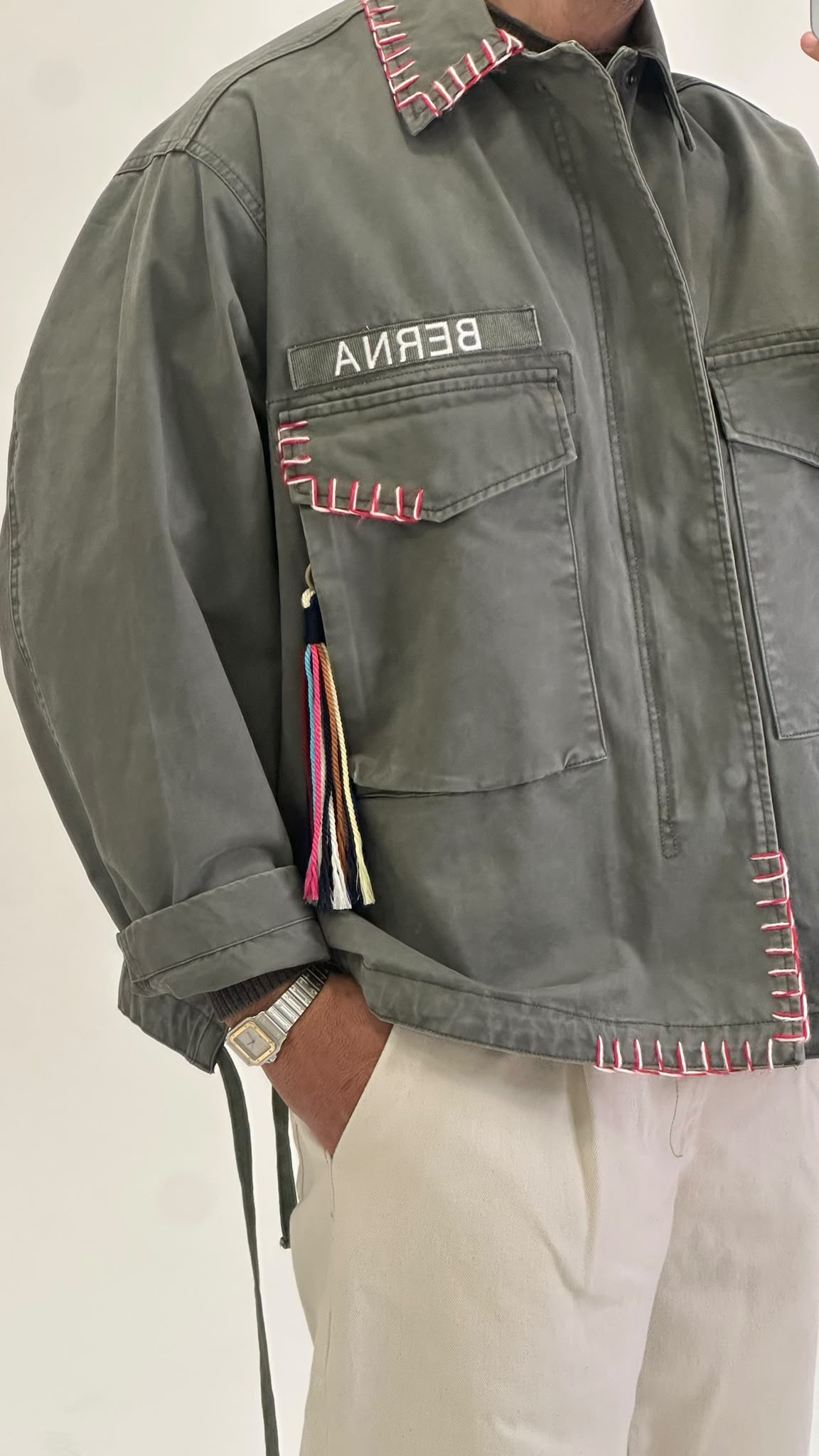 Field jacket verde militare con cuciture a contrasto