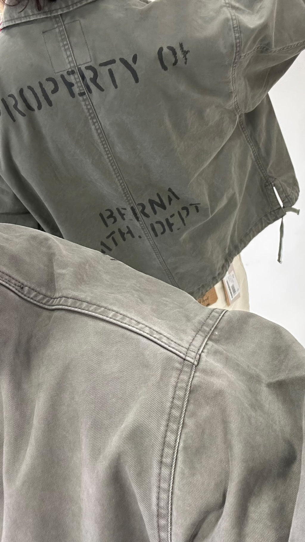Field jacket verde militare con cuciture a contrasto